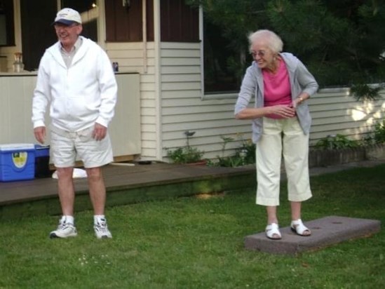 Dad and Auntie Flo playing Texas Horseshoes 2009