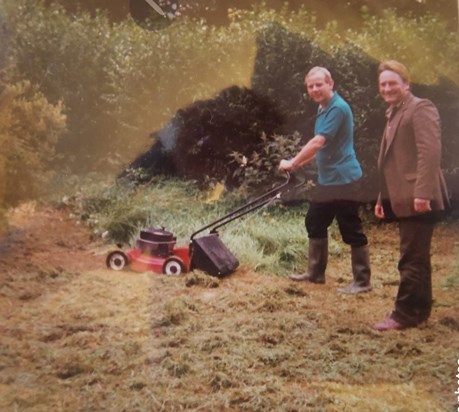 Dad and Uncle Liam mowing the grass at Glena Hoyse 