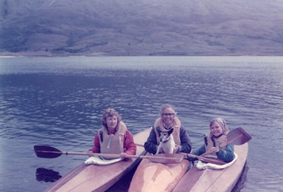 Dad loved canoeing - and making canoes! This is mum, dad, Jenny & our dog, Dixie out on the water.