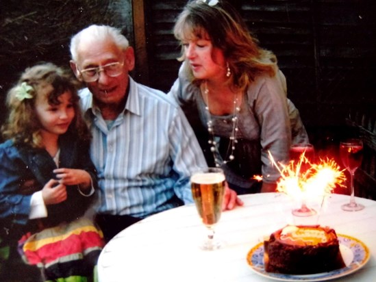 Savanna and Great Grandad  readying  themselves to blow out the candles