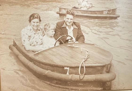 Peter and his parents enjoying a boat ride in Coventry