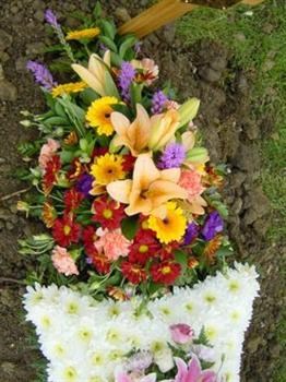 Flowers placed on the coffin