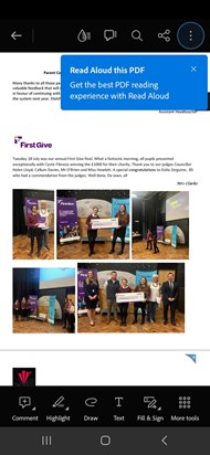 Eliza and Esmé receiving the Big Cheque from First Give