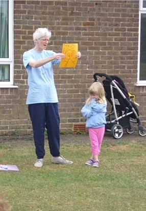 Here's Claire doing what she did best, showing off her little bear's achievements with pride! July 2010 