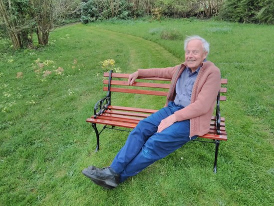 Harry relaxing in Helen's garden on the seat he had rubbed down and stained April 2019