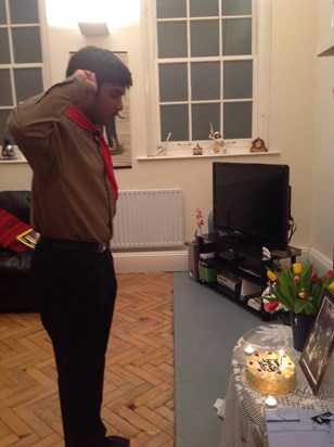 visnu is giving the scout salute to his big brother