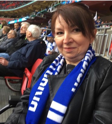 Joanne cheering on the seagulls at the FA Cup semi-final last year.
