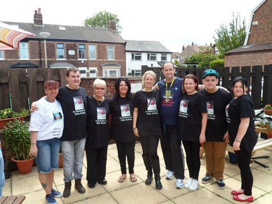 Kaiden's family with Mick after the Tunnel Run