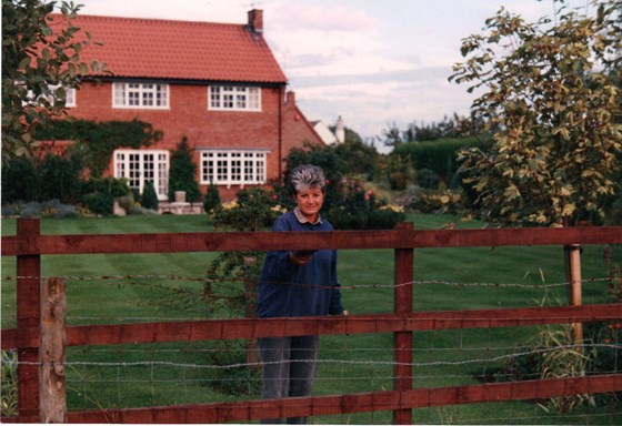 Carol has always been a "good right hand" help - here creosoting at Abbey House, Diseworth.