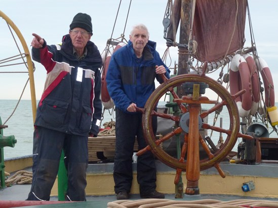 Don helming Thames barge, 'Repertor'.