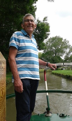 John in his element, cruising the canals.