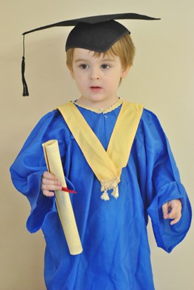 Thought you'd like to see your youngest grandson in his graduation gown. x