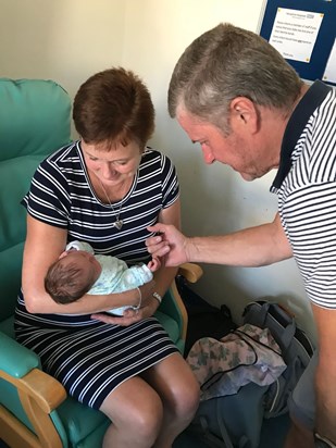 Meeting his Granddaughter for the first time