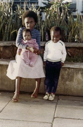 Young Alex(on the right) with his siblings