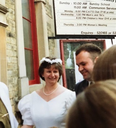 Sandy looking happy and beautiful on her wedding day.