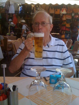 Enjoying his beer! 