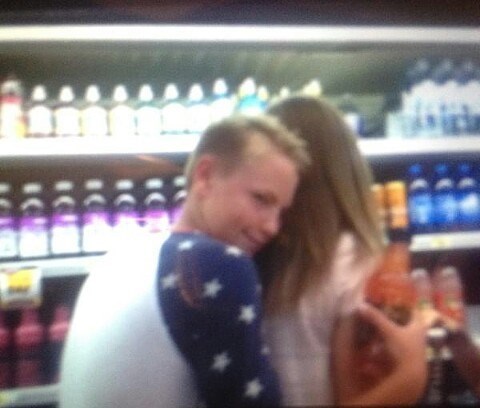wes hugging Katelyn Barrett after she bought him a Sobe drink from Ridley's in highland