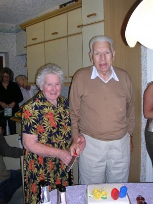 Grace with Norman at his 80th birthday party in September 2004