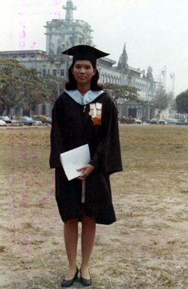 Cherie poses in front of the UST Main Building right after her graduation from college.