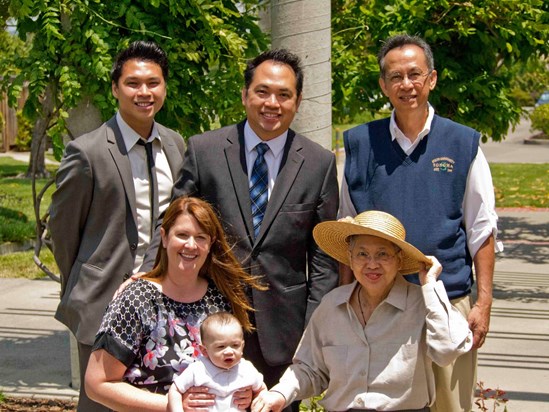 A happy Galvez family celebrating Alex's entry to the Christian world