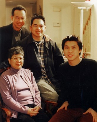 Jun makes sure there is a family picture taken every year.