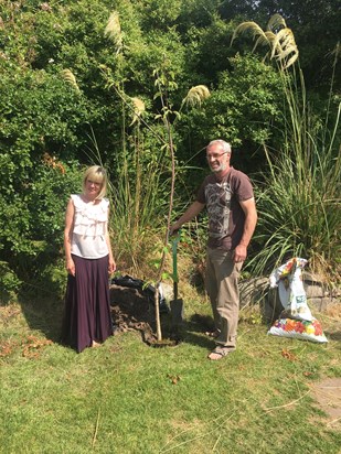 Mam & Dad planting the cherry tree