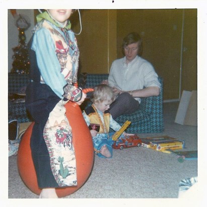 1970s Christmas day snapshot...classic space hopper, cowboy combo! 